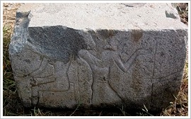 Temple wall at Behbeit el-Hagar, the relief is missing in the upper left corner