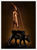 Replica statue of Tutankhamun standing on a panther