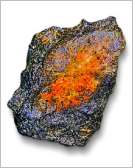 60-gram fragment of the Gebel Kamil meteorite.
