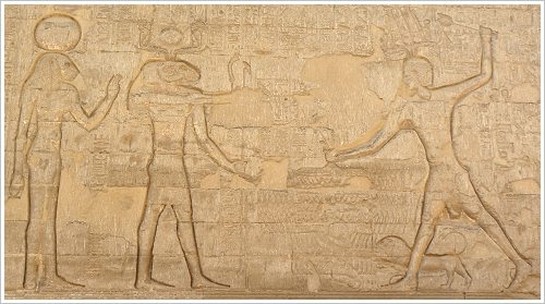 Khnum Temple at Esna - Emperor Domitian smiting his enemies in front of Menhit and Khnum