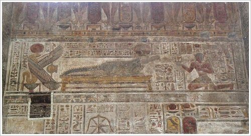 Khnum Temple at Esna - Restored temple wall: Wadjet, the cobra goddess, and the crocodile god