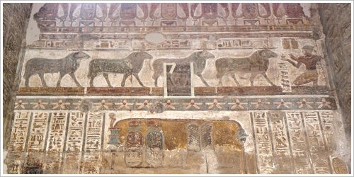 Khnum Temple at Esna - Restored temple wall: Domitian kneels in front of 4 depictions of Khnum